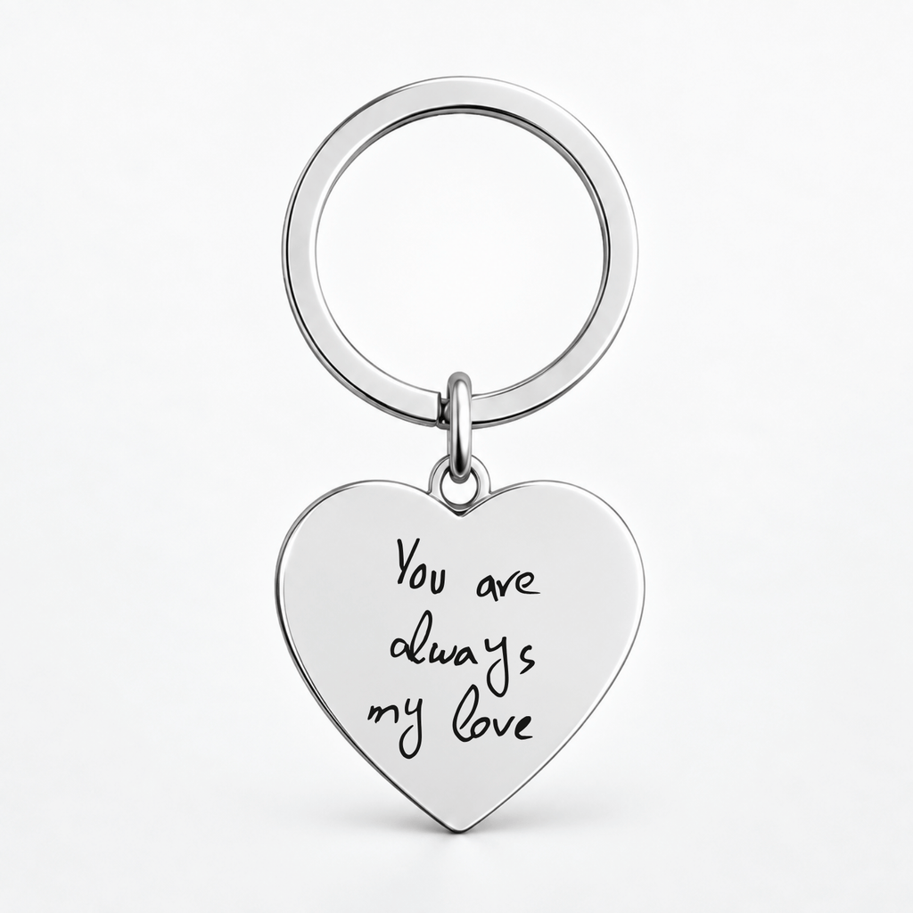 A silver heart-shaped keychain with the engraved black text 'You are always my love', attached to a matching silver split key ring, shown on a clean white background.