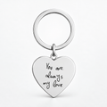 A silver heart-shaped keychain with the engraved black text 'You are always my love', attached to a matching silver split key ring, shown on a clean white background.