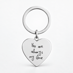 A silver heart-shaped keychain with the engraved black text 'You are always my love', attached to a matching silver split key ring, shown on a clean white background.