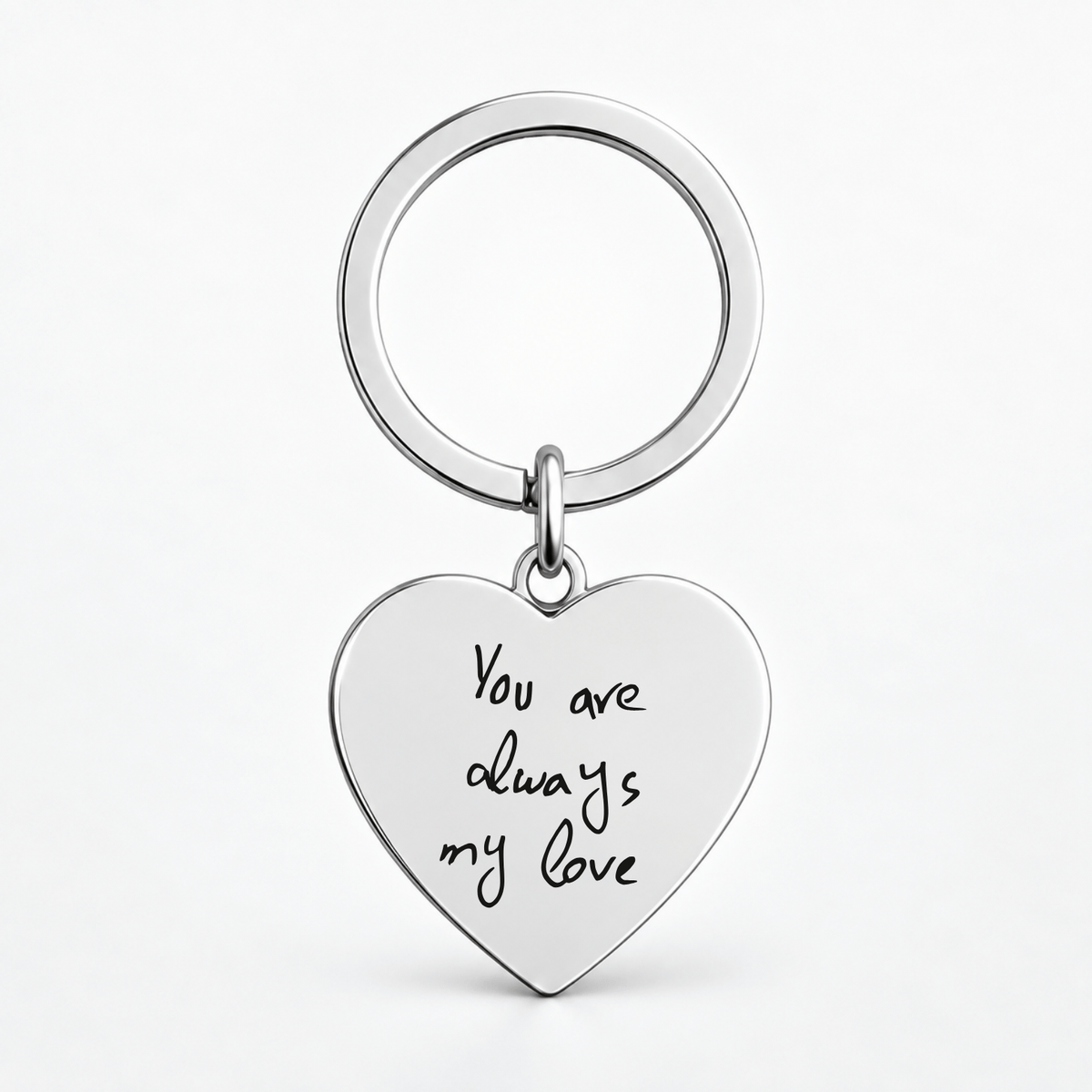 A silver heart-shaped keychain with the engraved black text 'You are always my love', attached to a matching silver split key ring, shown on a clean white background.