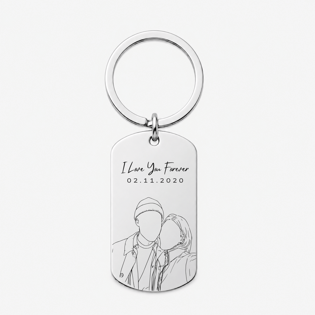 A silver metal dog tag keychain with a circular split ring, featuring engraved text reading 'I Love You Forever' and the date '02.11.